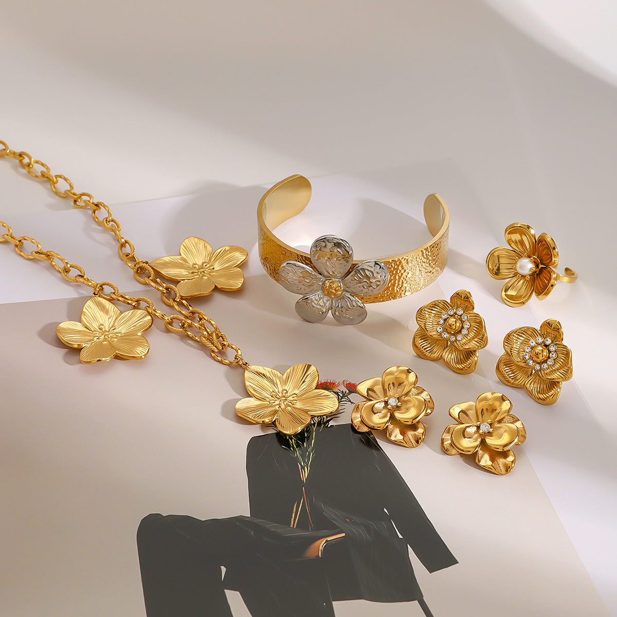European and American Stainless Steel Flower Necklace Advanced Sense Zircon Earrings Pearl Ring Open Bracelet Titanium Steel Jewelry